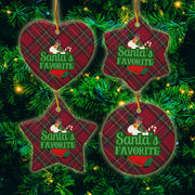 a festive Christmas tree adorned with ornaments shaped like a heart, star, and a round ornament. The ornaments are red and green plaid, and each one has a Santa Claus design. The ornaments are hanging from a string, creating a cheerful and holiday atmosphere.