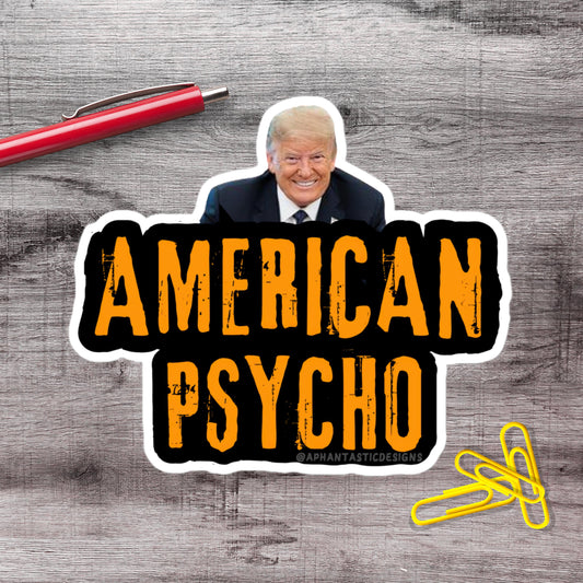 a sticker with a man's face and the text "AMERICAN PSYCHO" in bold, orange letters.