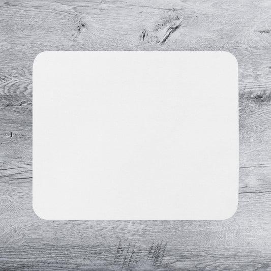 a white rectangular shape on a wooden surface.