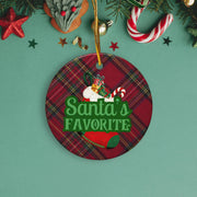 A Christmas ornament with a plaid pattern and the text "Santa's FAVORITE" is displayed on a green background.
