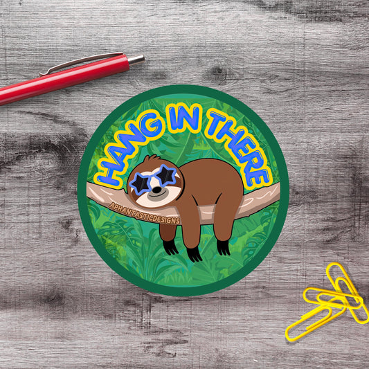 A sticker featuring a cartoon sloth hanging on a branch with the text "HANG IN THERE" written around it.