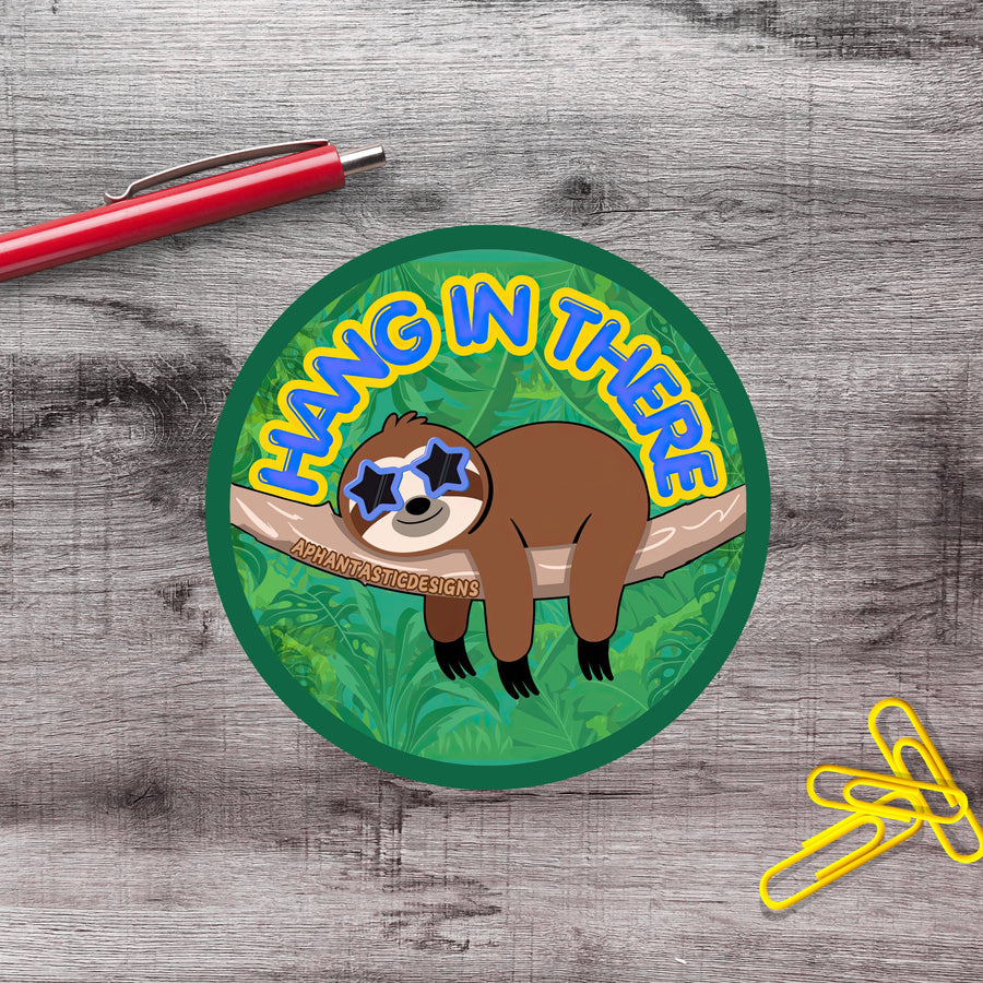 A sticker featuring a cartoon sloth hanging on a branch with the text "HANG IN THERE" written around it.