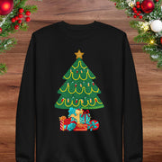 A black long-sleeved sweater with a Christmas tree design on it, surrounded by holiday decorations such as berries and ornaments.