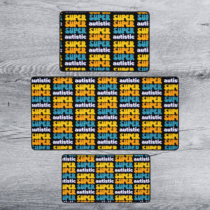 a repeating pattern of the word "autistic" in various colors, including yellow, orange, and blue, arranged in a grid-like layout.