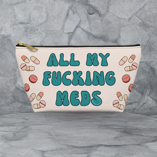 A cosmetic bag with a humorous text printed on it.