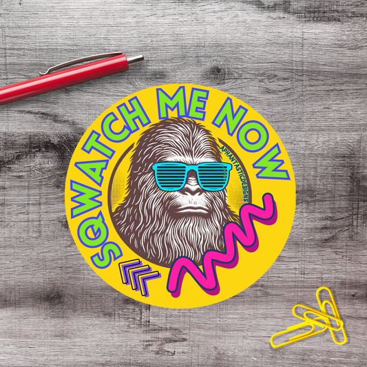 A colorful sticker featuring a cartoon character wearing sunglasses and the text "Watch Me Now" in a playful, retro style.