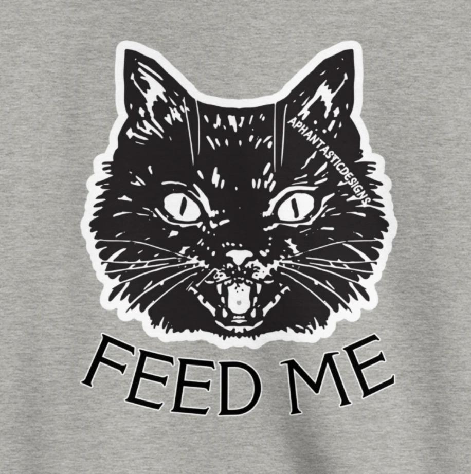 A gray sweatshirt with a black cat graphic and the text "FEED ME" printed on it.