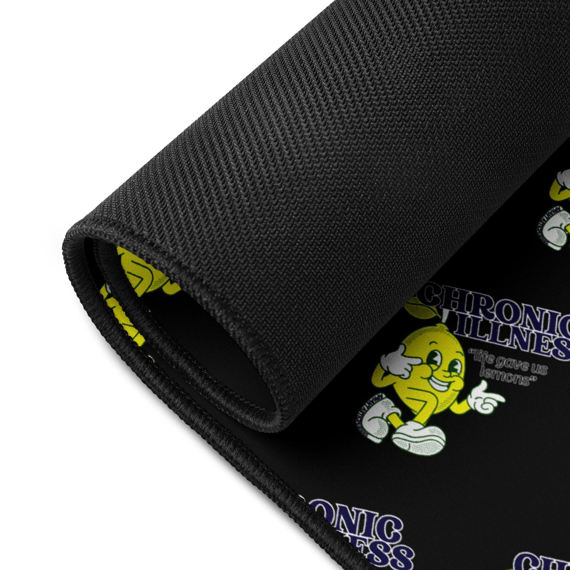 a black rubber mat with a yellow cartoon character and text printed on it.