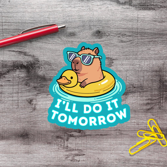 A sticker with a cartoon image of a duck wearing sunglasses and floating on an inflatable ring, along with the text "I'll do it tomorrow".
