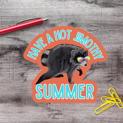 a sticker with a raccoon wearing sunglasses and the text "Have a hot jimothy summer" on a wooden surface.