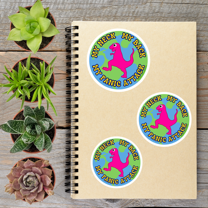 a spiral notebook with stickers on it, along with several potted plants arranged on a wooden surface.