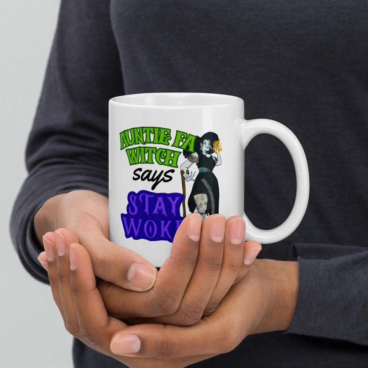 The image is a promotional graphic for a company called "Aphantastic Designs". It features a black sweatshirt with a cat design, a water bottle with stickers, and a plant in a white pot. The text above the image reads "I've tested multiple vendors to find the best premium products around!"