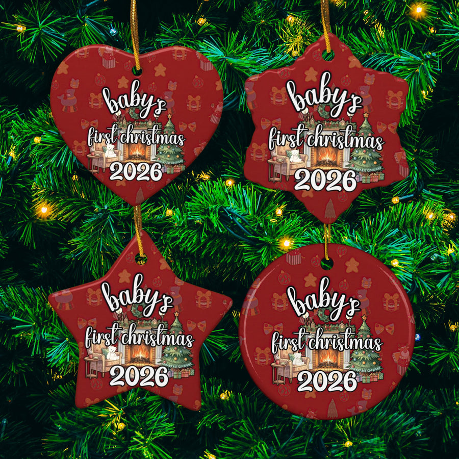four red Christmas ornaments hanging on a tree, each with the text "baby's first christmas 2026" printed on them.