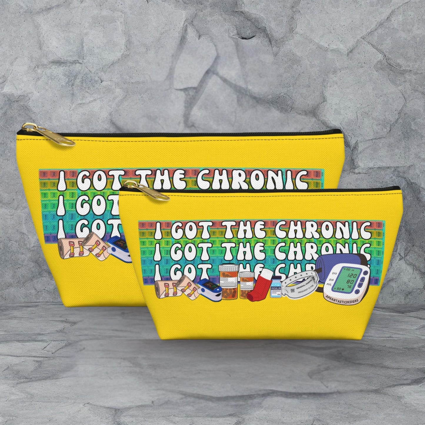 Two yellow tote bags with a colorful graphic and text printed on them.