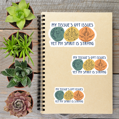 a notebook with stickers on it, along with four potted succulent plants arranged on a wooden surface.