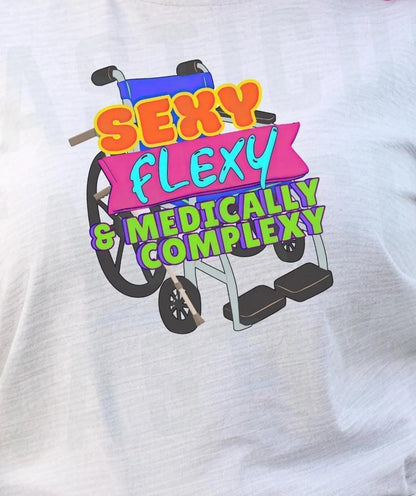 A person with tattoos on their arms and legs is wearing a gray t-shirt with a colorful graphic design on it.