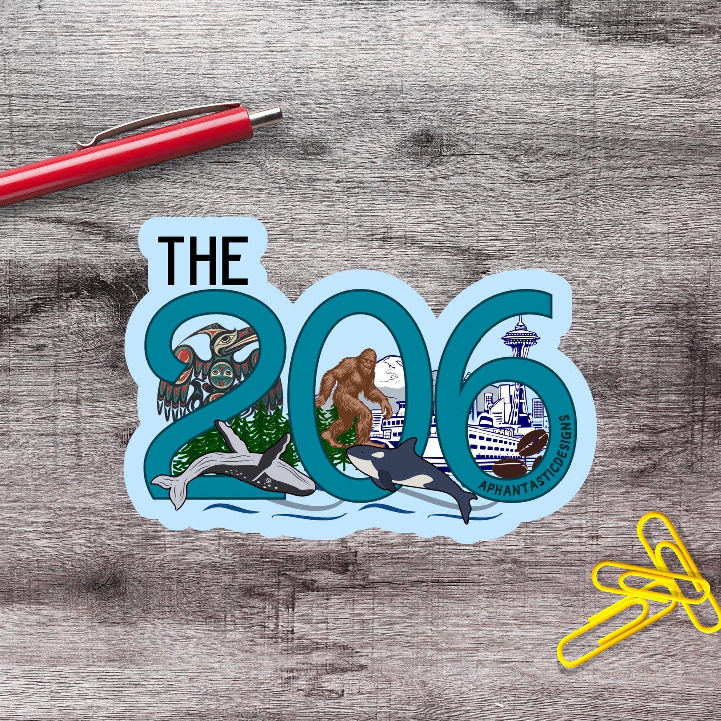 A sticker with the number "206" and various wildlife and nature-related images, such as a whale, a bear, and a bird, along with the text "The 206" and "APHANTASTIC DESIGNS".