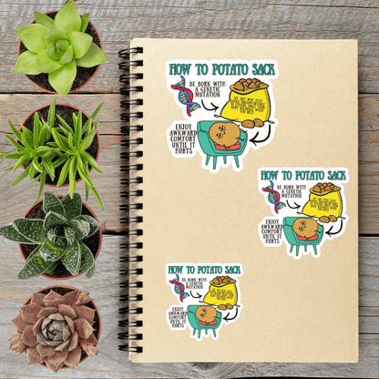 a spiral notebook with various stickers on it, along with several potted plants arranged on a wooden surface.