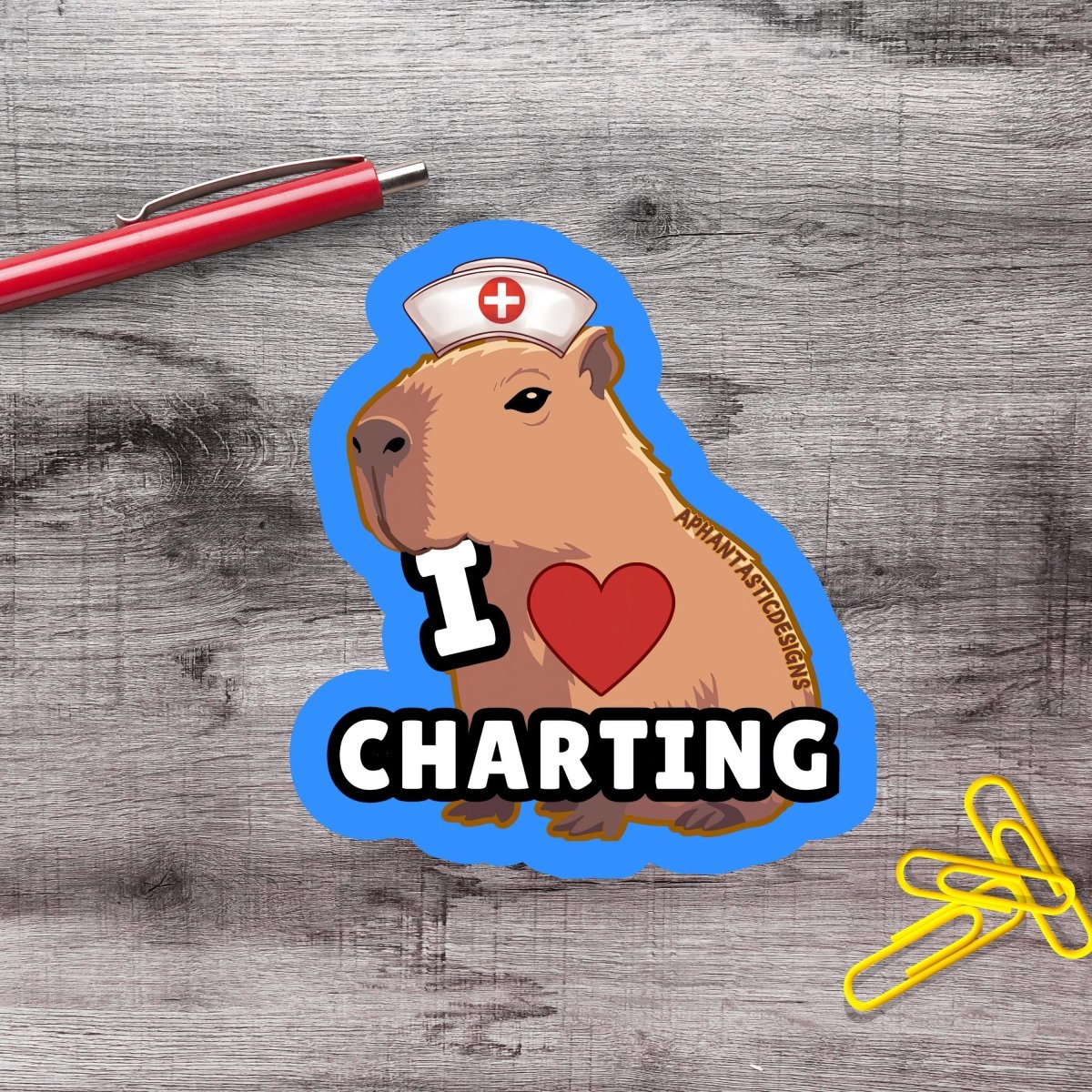 A sticker depicting a cartoon character wearing a nurse's hat and a red heart, with the text "I CHARTING" written below.