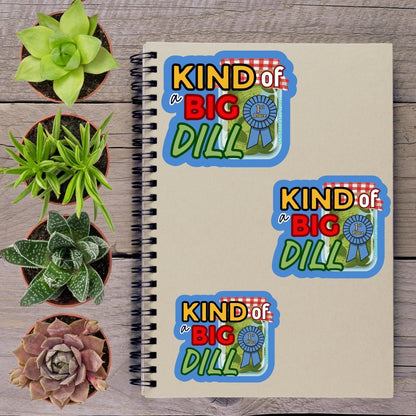 a spiral notebook with stickers on it, surrounded by four potted succulent plants.