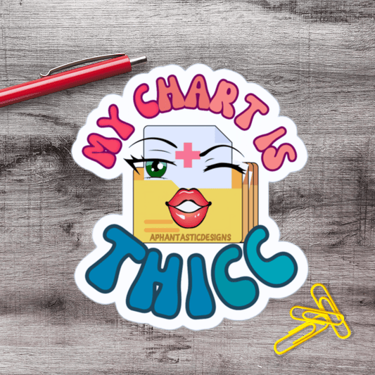 A sticker with a cartoon character and the text "MY CHART IS THICK" on a wooden surface.