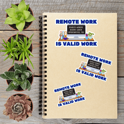 a notebook with stickers on it, along with several potted plants arranged on a wooden surface.